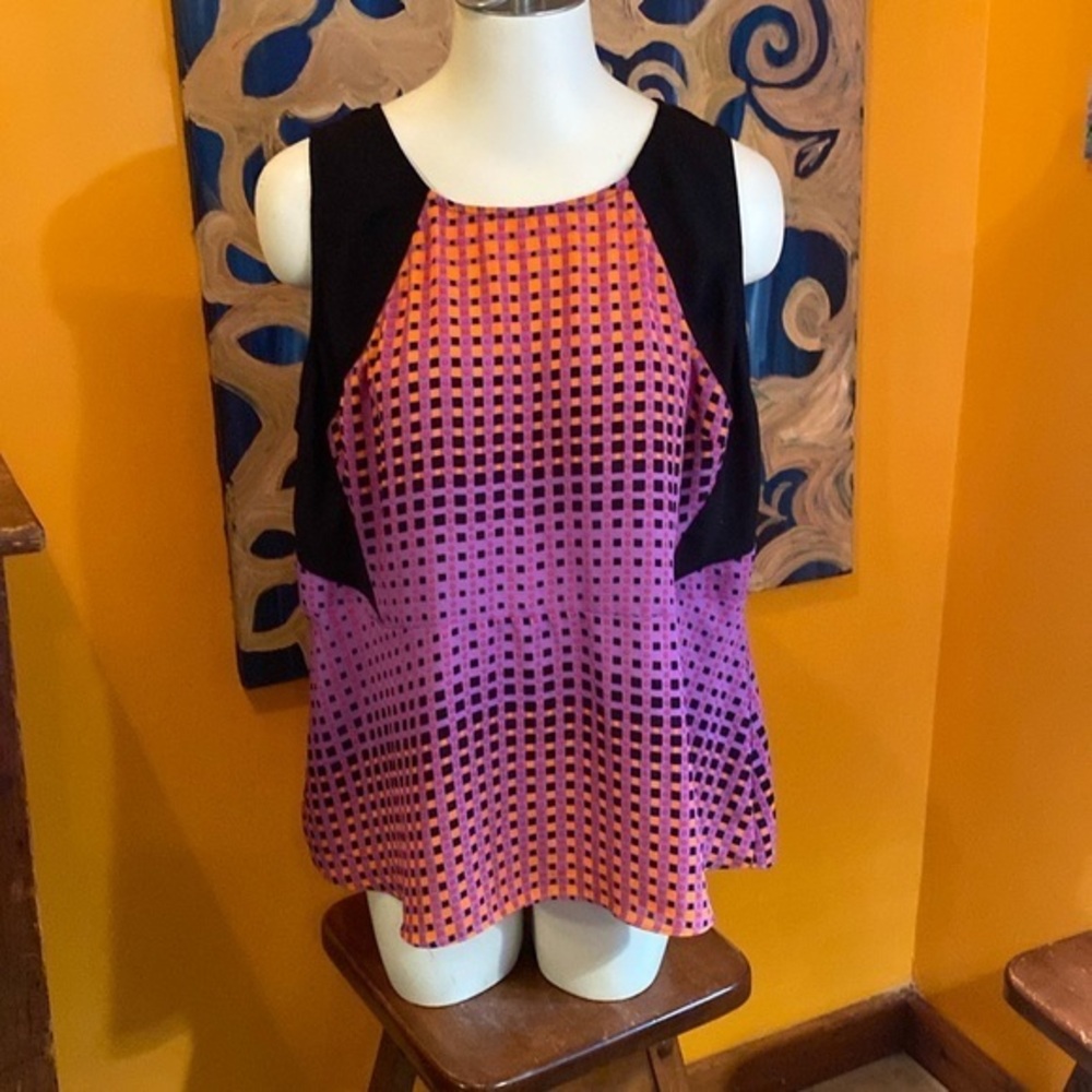 Brightly Colored Sleeveless Peplum Top